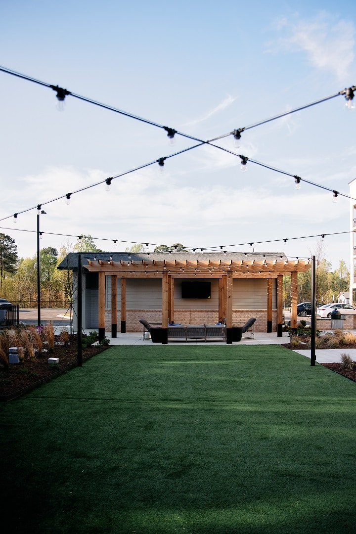 outdoor turf and lights with sitting area